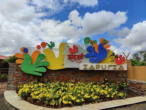  The entrance sign of the Zapurza Museum of Art & Culture. The colorful sign features the museum's name and a vibrant design that hints at the creative and artistic nature of the museum.